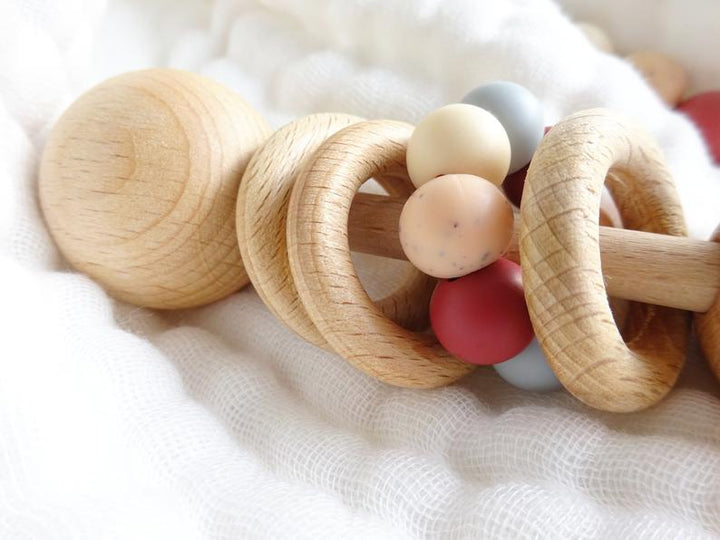Discover the Joy of Play with Our Baby Wooden Rattle Silicone Bead Chewable Toy